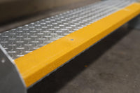 RAPTA Heavy Duty Steel Steps – Double Tread with yellow non-slip strip close up of tread