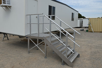 Rapta Aluminium Access Stairs with adjustable feet installed at a modular building entrance