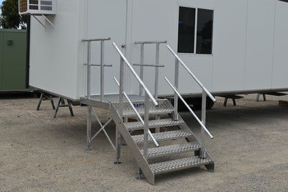 Rapta Aluminium Access Stairs with handrail installed at a modular building entrance