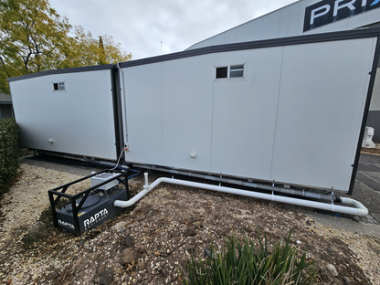 RAPTA CabinPump Ultra wastewater system connected to modular site amenities
