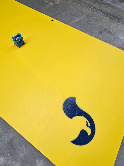 RAPTA Heavy-Duty Road Plate Lifter installed in a yellow steel road plate with RAPTA branding