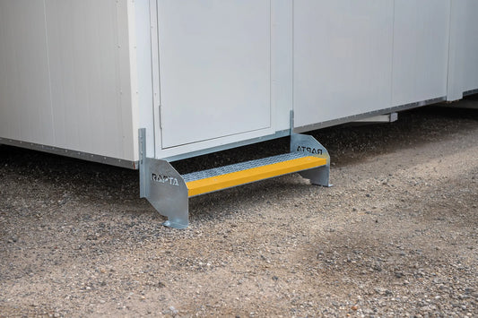 Rapta Heavy Duty Steel Steps - single - with yellow safety nosing installed at a modular building entrance
