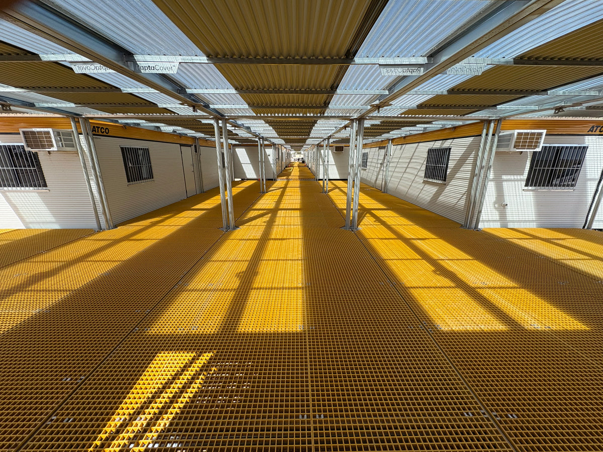 RaptaCover™ covered walkway installed between modular site buildings.