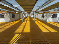 RaptaCover™ covered walkway installed between modular site buildings.