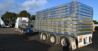 Stacked RaptaCover™ modules secured on a semi-trailer for transport.
