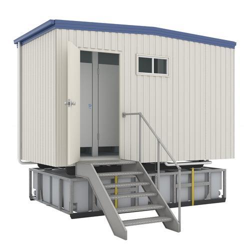 RAPTA waste water holding tank installed beneath a portable building with access stairs