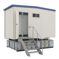 RAPTA waste water holding tank installed beneath a portable building with access stairs